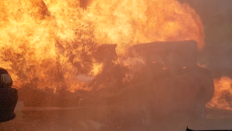 fire explosion flammable car fire on street smoke, hot danger flame burning effect. fire burn car accident disaster conflagration. arson disaster burning fire flame high heat almost explode.