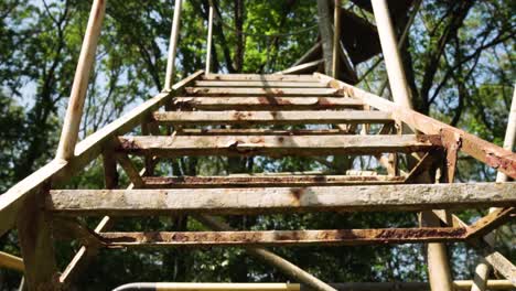 rusty metal stairs in a forest tower