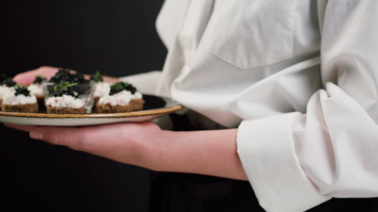 Professional Serving Black Caviar Canapes on a Plate