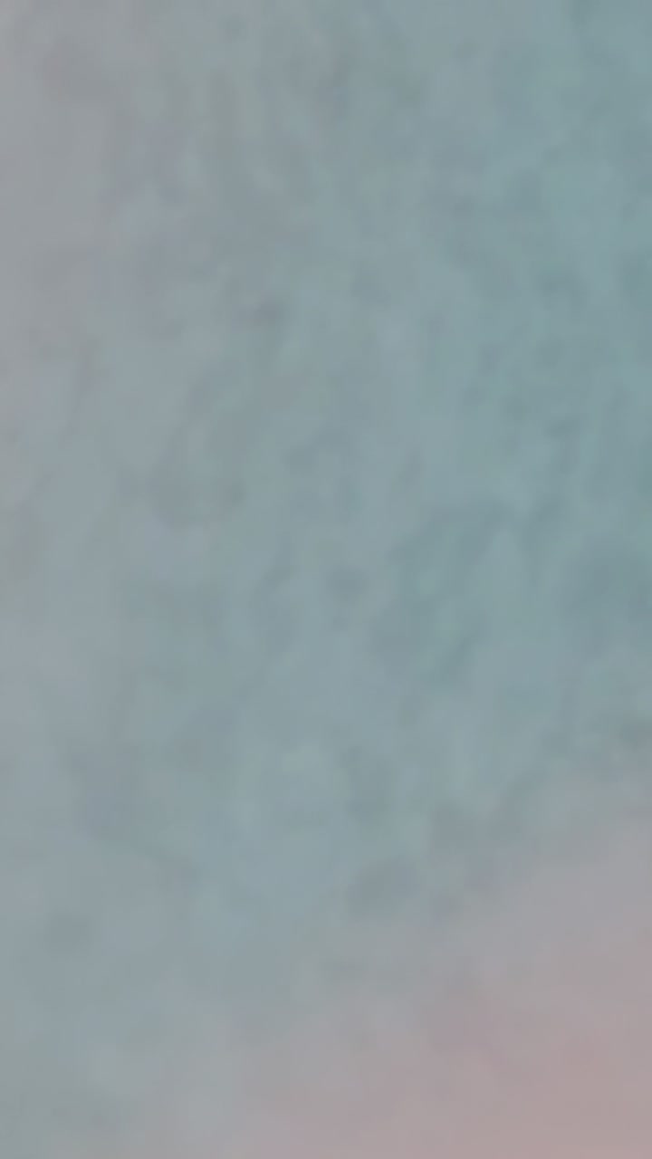 Vertical video: Color field transitioning on screen after frame progression, with gradient effect