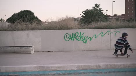 skateboarder performing tricks in an urban skatepark