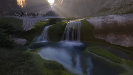 serene waterfalls with a lakeside cafe in misty sunlight