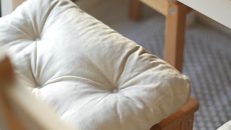closeup of a light beige chair cushion