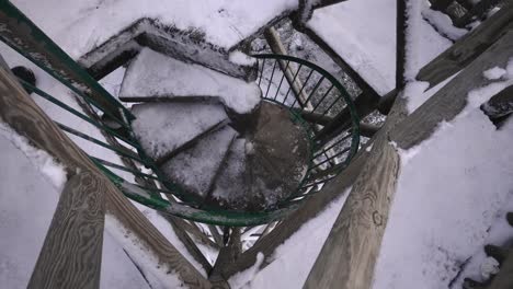 High-angle-view-of-ice-covered-stairs-up-the-Mérelle-Tour,-Gérardmer-France