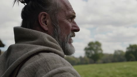 elderly man in historical clothing