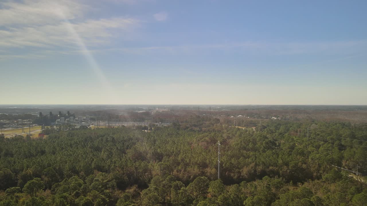 Drone Flying Over Trees and Power lines