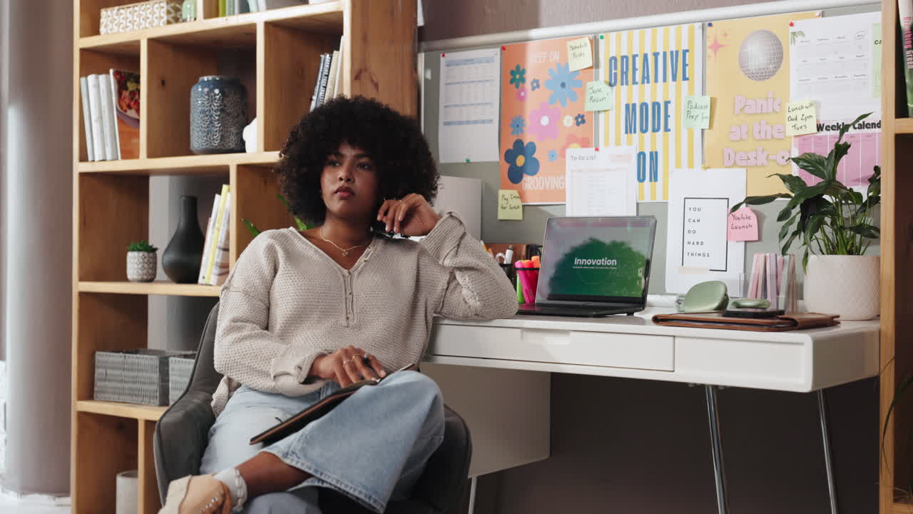 A Woman Working at Her Home Office Desk
