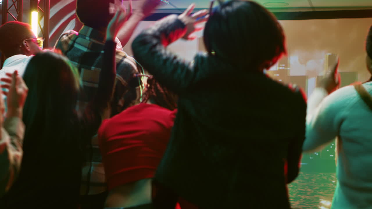 Energetic Crowd Dancing at a Lively Party