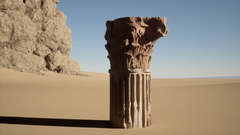 an ancient stone column in the desert