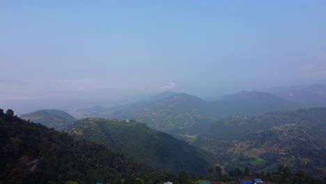 misty sky over mountain villages in nepal, south asia