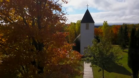 panning view of church in autumn