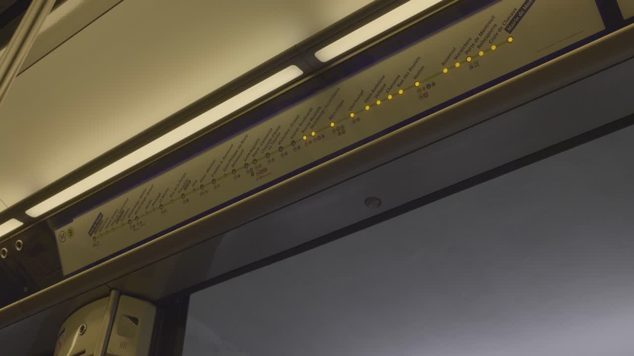Traveling on the Paris subway, a close-up shot of the route indicator with glowing lights