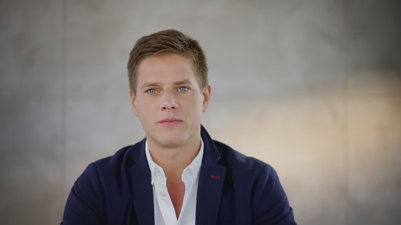 Man in Business Outfit Laughing and Smiling