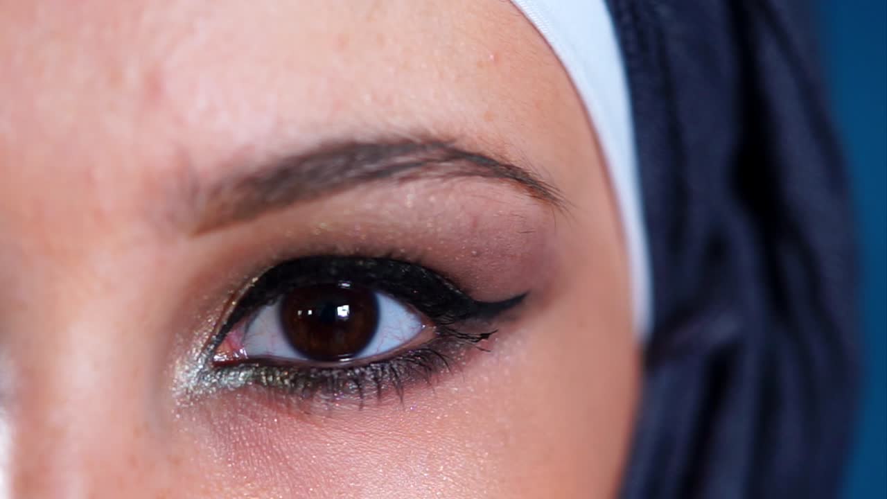 Close-up of Woman's Eyes with Makeup and Hijab