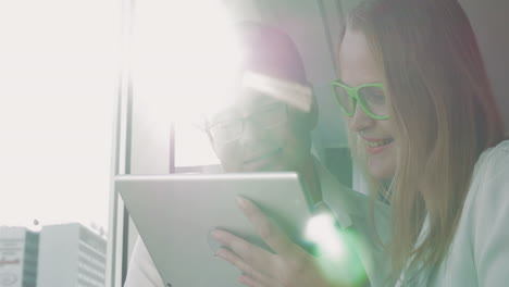 People-in-Glasses-with-Tablet-PC