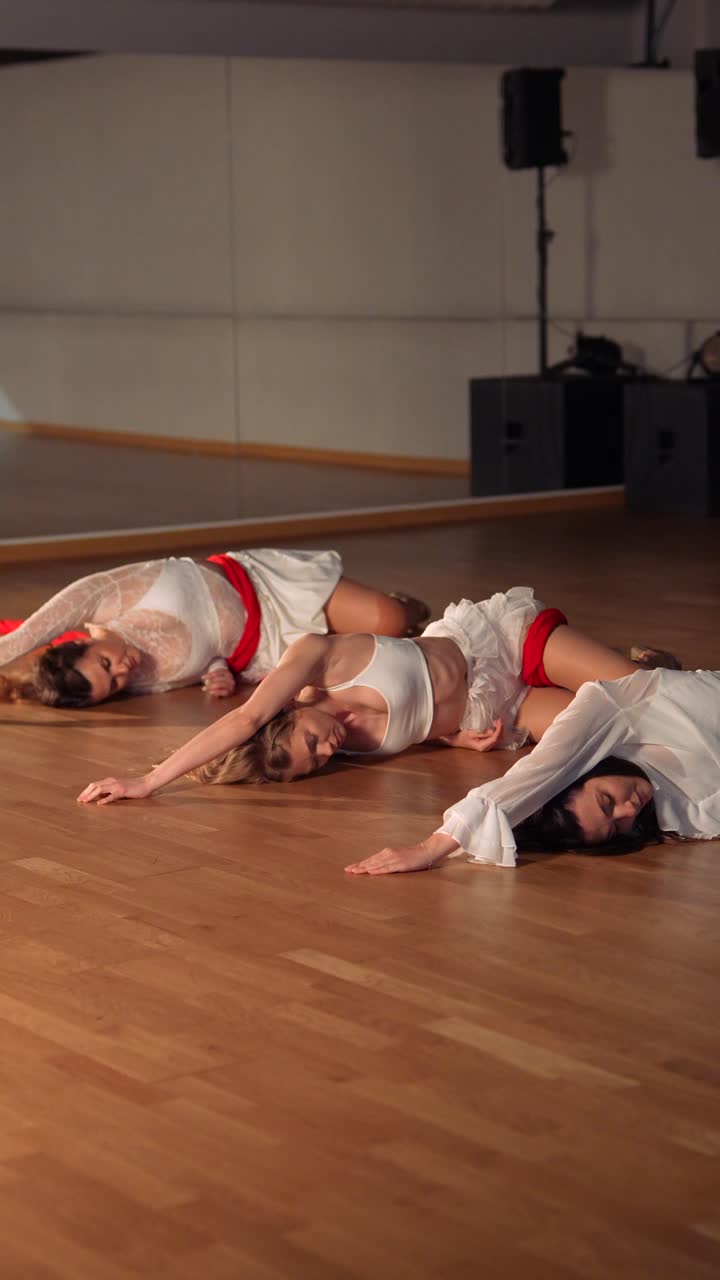 Contemporary Dance Performance with Red Ribbons