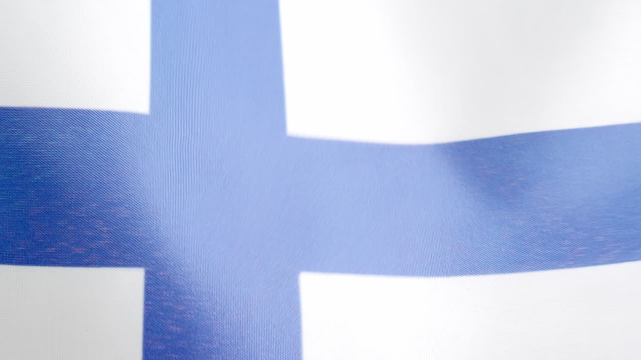 Finnish national flag waving by the wind