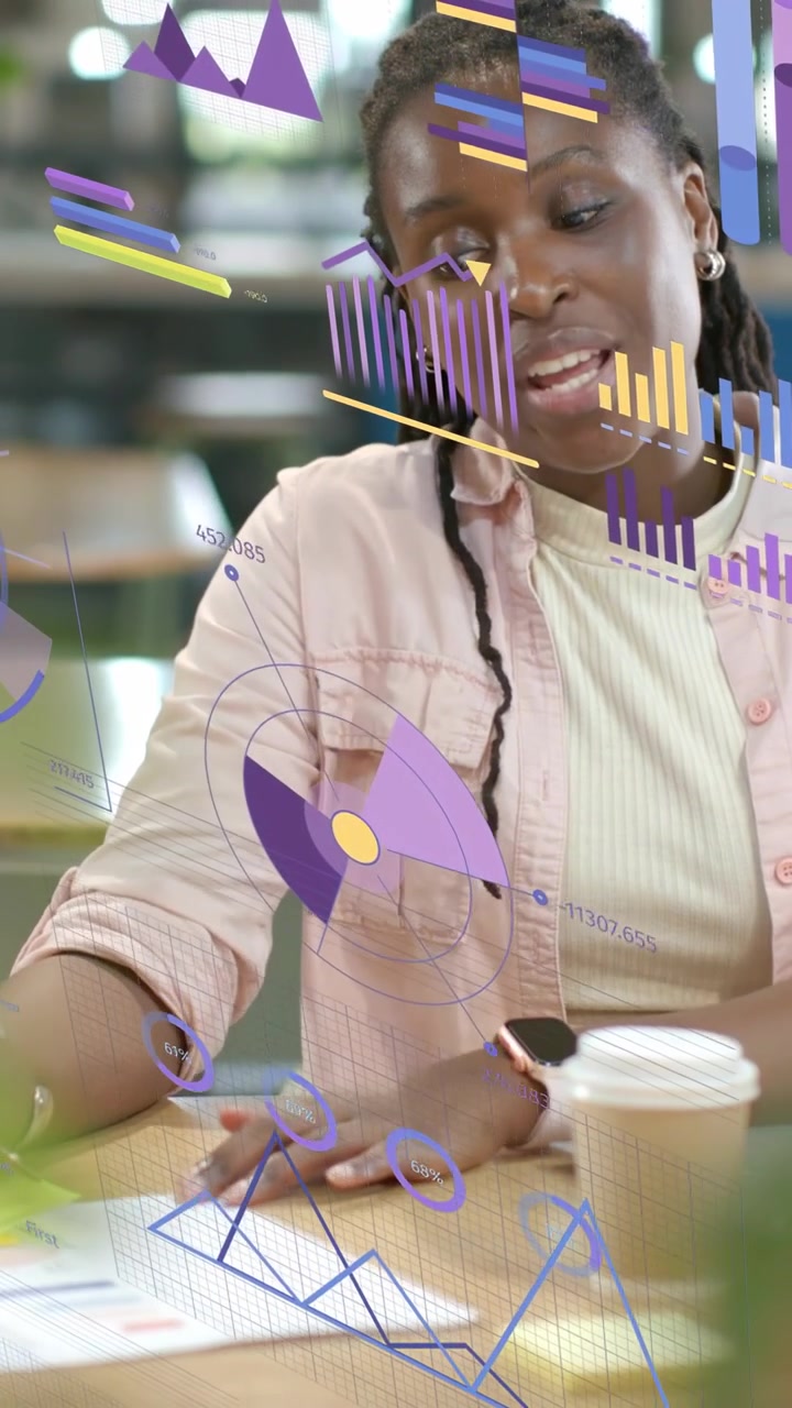 Video vertikal: Dia meraih kertas, membuat grafik AR yang selaras dengan gerakan, meninjau data bisnis
