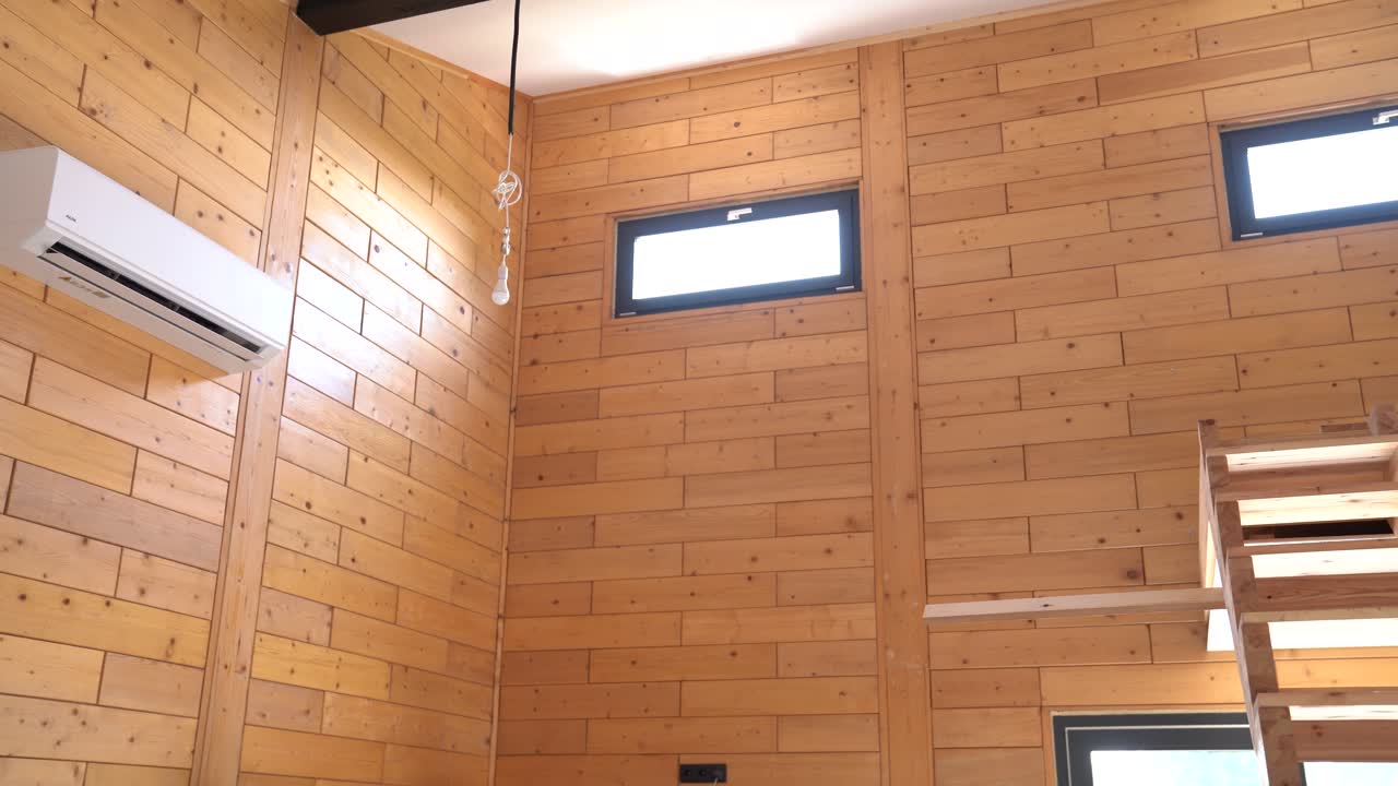 Interior Wooden Wall Paneling with Air Conditioner and Modern Minimal Lighting