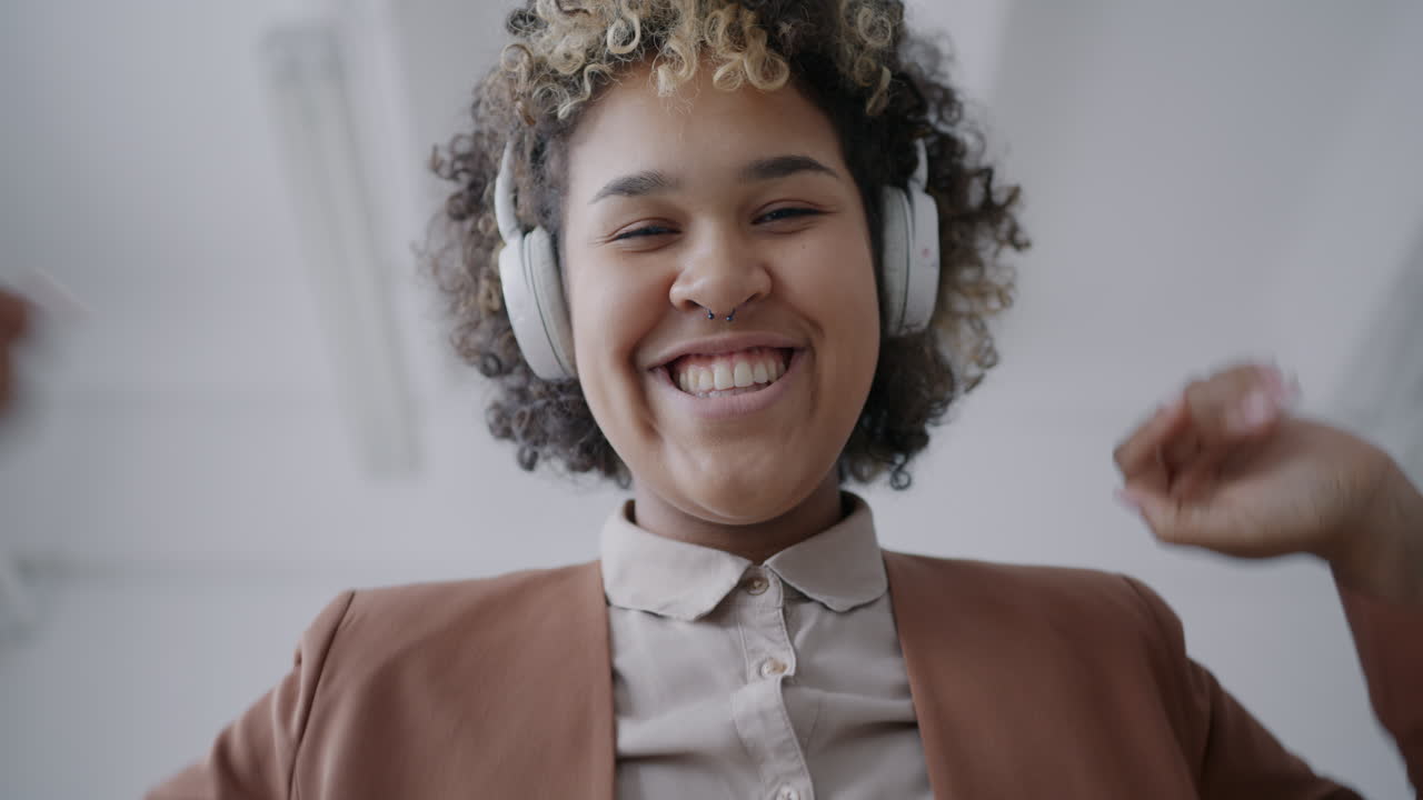 Happy Woman Dancing During a Video Call