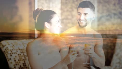 couple having a drink together during holiday with landscape for valentine day