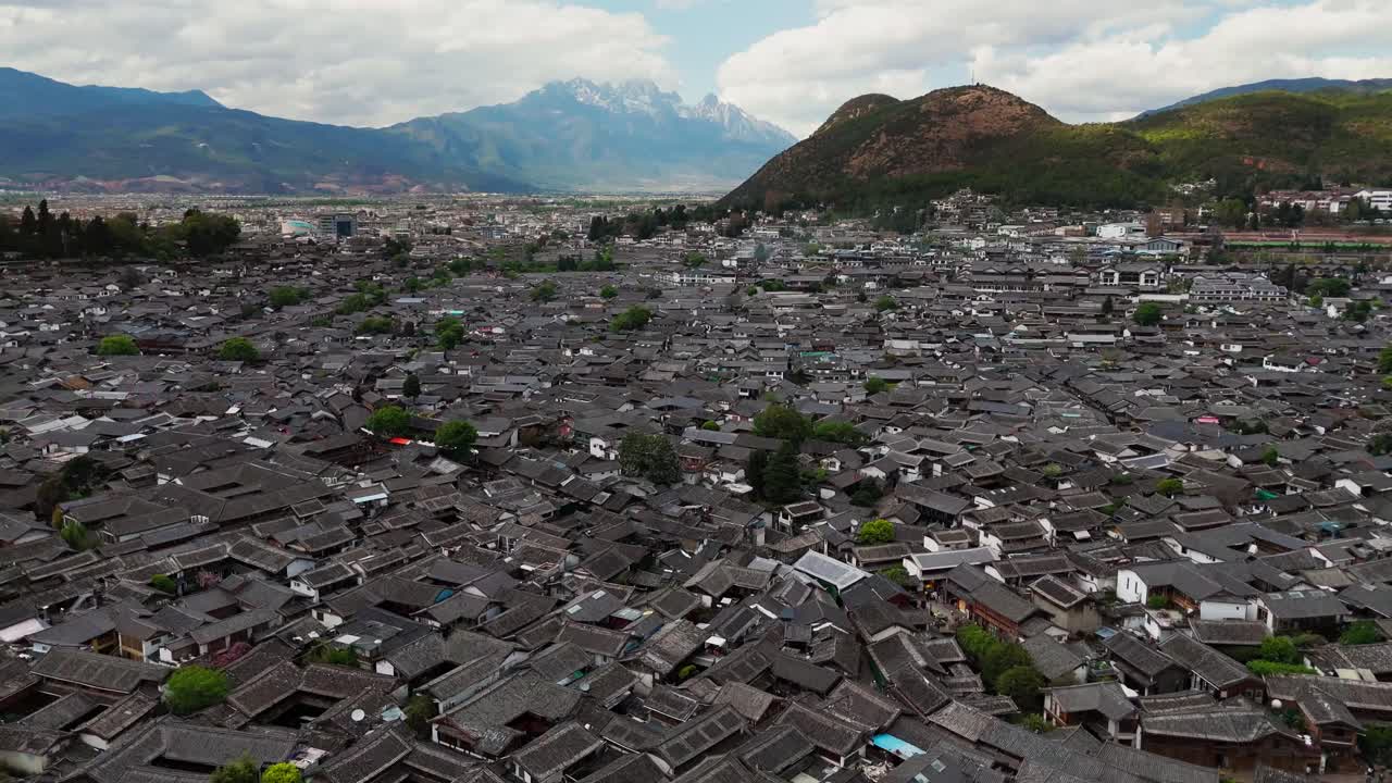 Aerial Drone Flyover of Ancient Lijiang City, UNESCO World Heritage Site in Yunnan Province