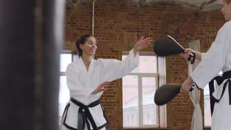 young woman doing martial arts