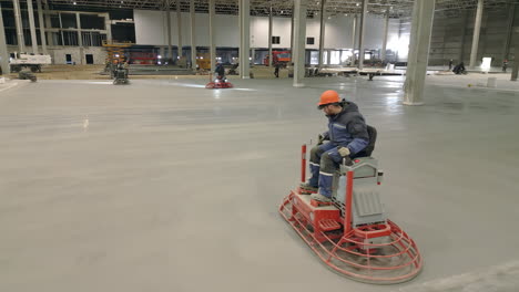 concrete floor finishing in a large industrial building