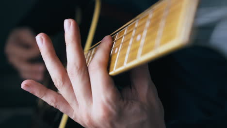 experienced musician hands perform various barre chords