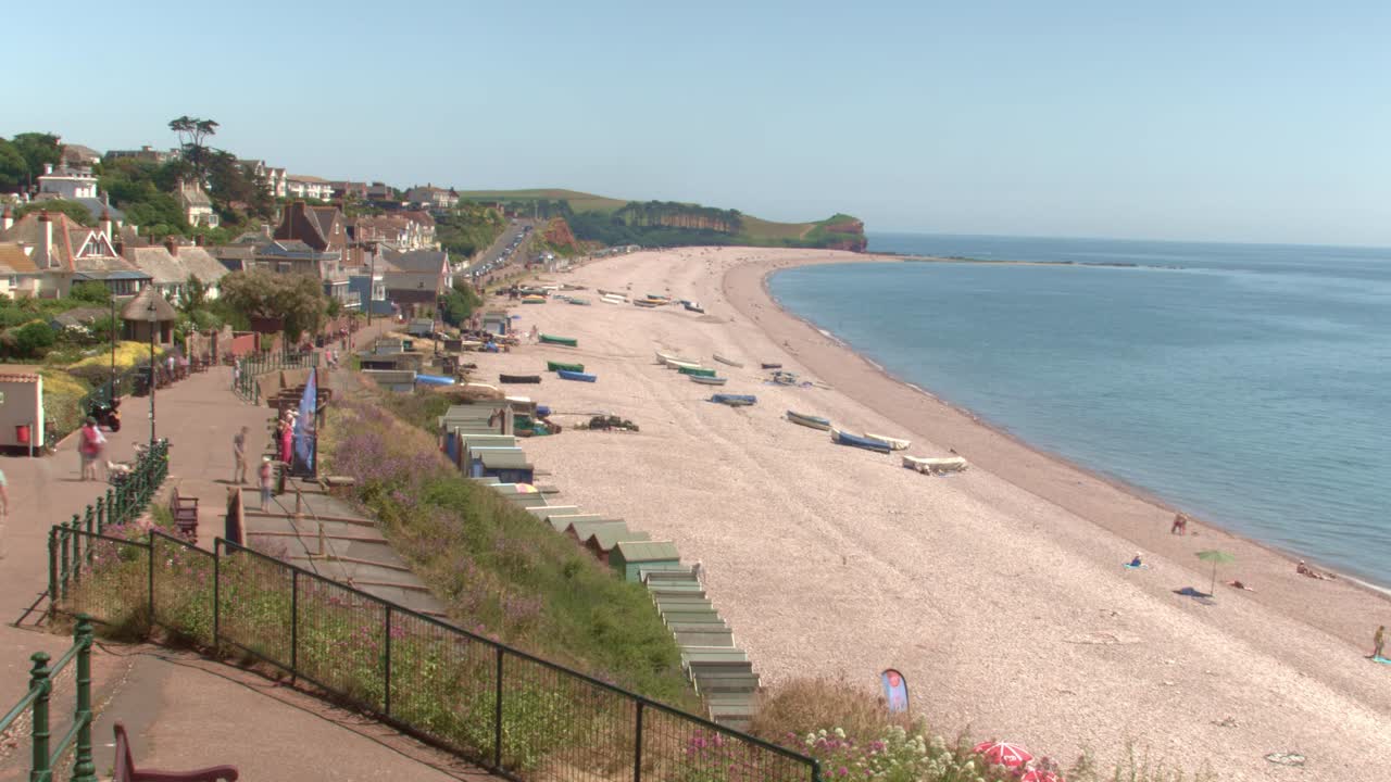 Scenic Beach with Boats and Beach Huts
