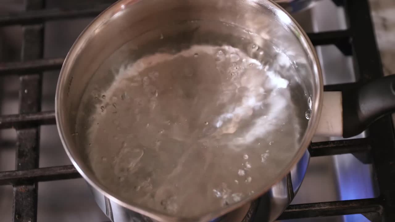 Top-Down View Of Water Boiling In 4K