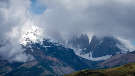 time lapse of snow capped andes peaks and moving clouds in torres del paine national park, patagonia, chile