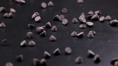 chocolate chips on dark surface