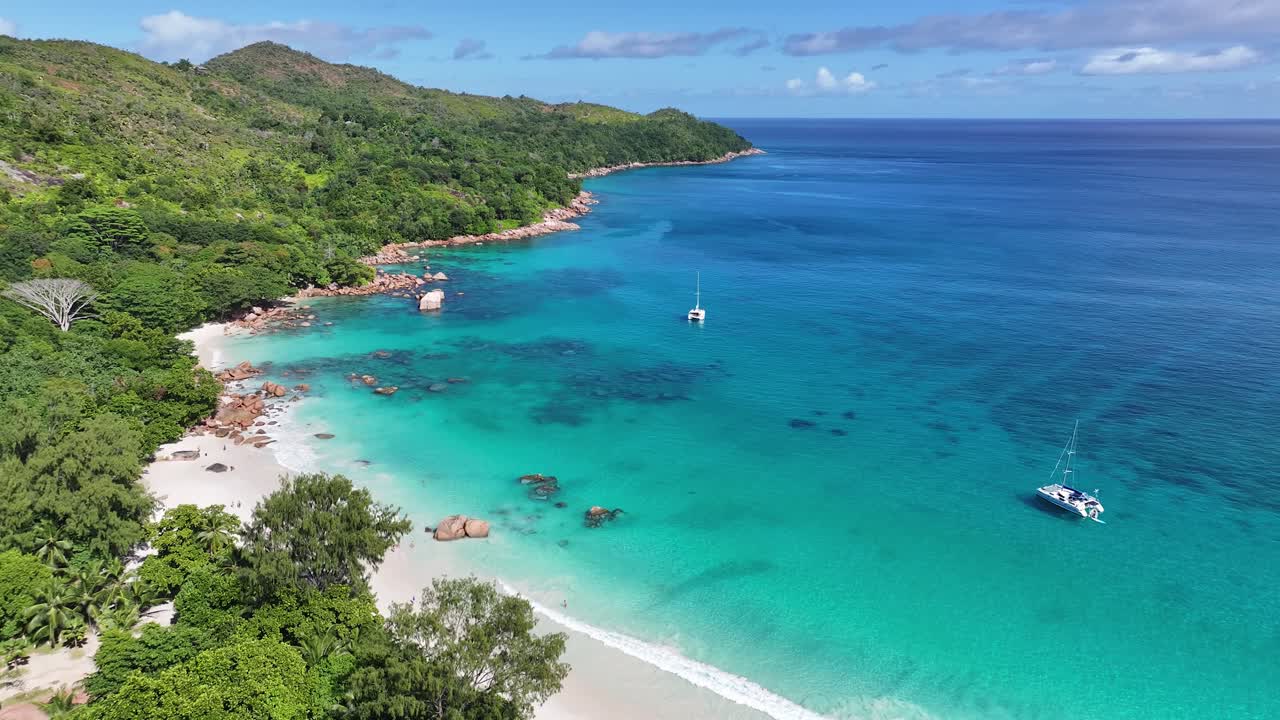Aerial view of Anse Lazio beach in Praslin, Seychelles, with turquoise water and boats