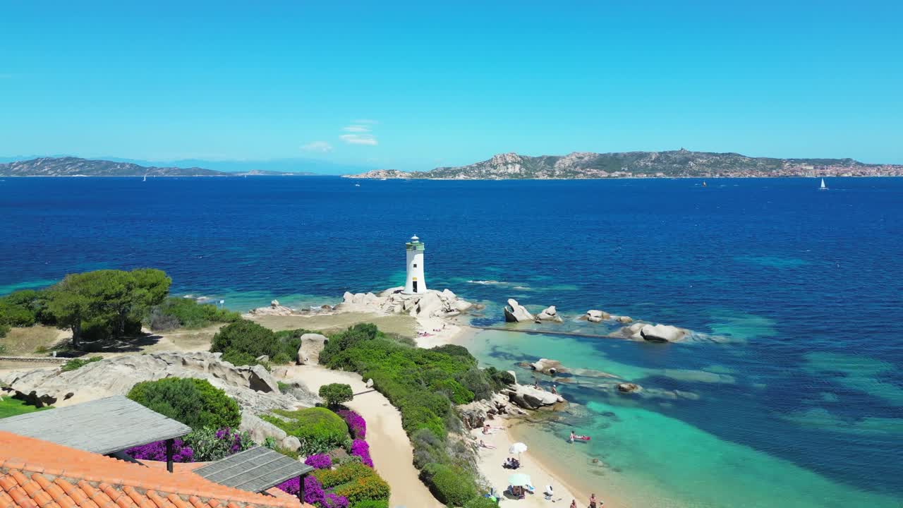 This stunning drone shot captures the Lighthouse of Punta Palau, set against turquoise waters and sculpted granite rocks—one of Sardinia’s most scenic seaside spots.