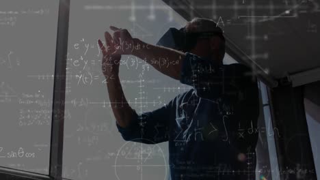 Man-using-a-VR-helmet-with-calculations-on-the-foreground