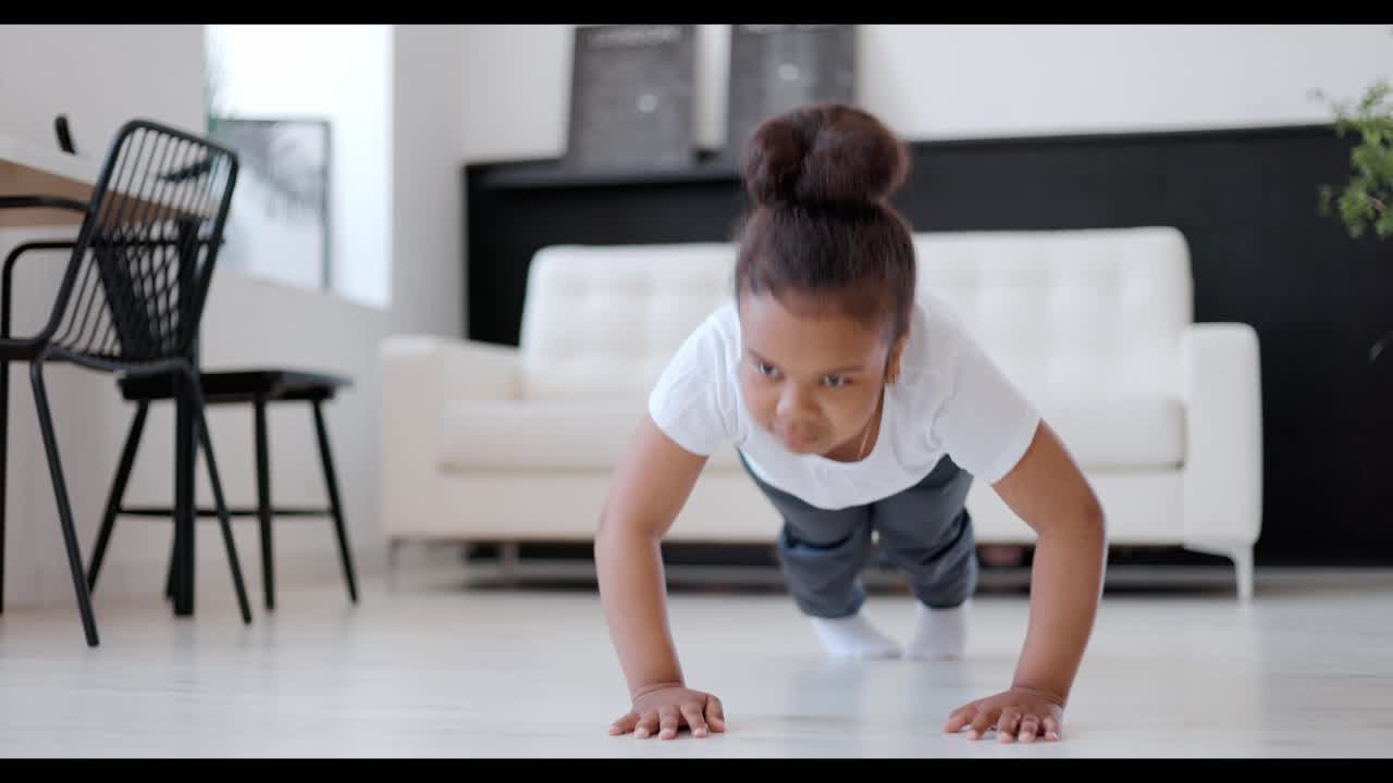Girl Doing Push-ups at Home