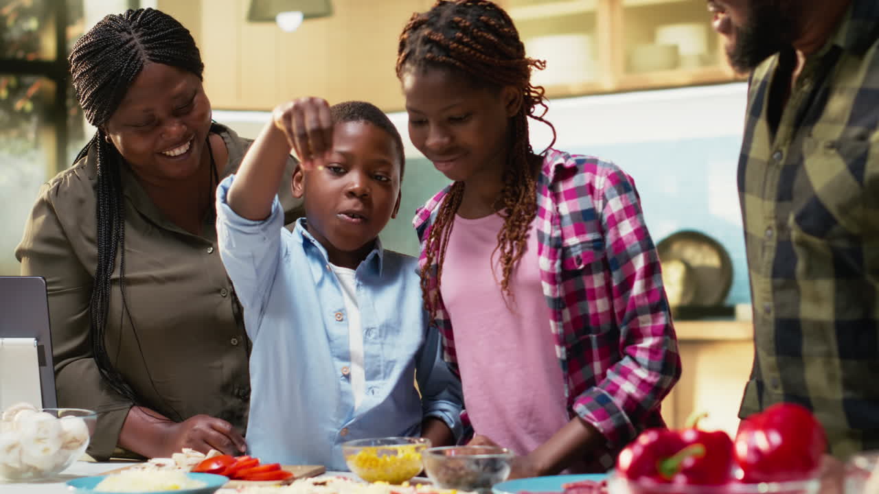 Family Cooking Pizza Together