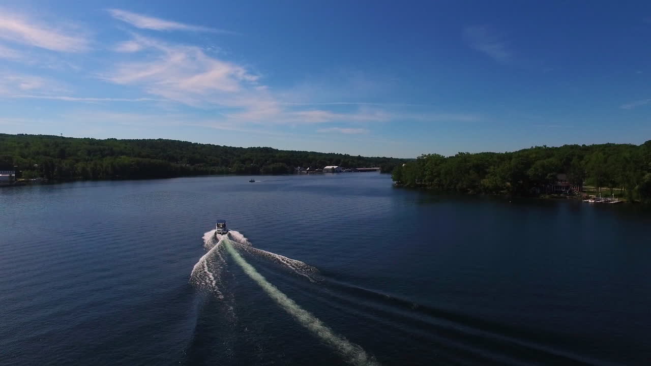 An aerial over a speedboat on Lake Winnepesaukee in New Hampshire
