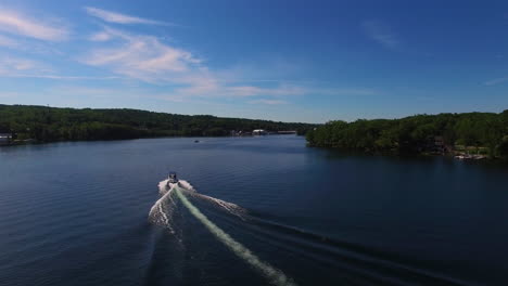 an aerial over a speedboat on lake winnepesaukee in new hampshire