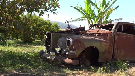 an old car sits abandoned and rusting on a ranch in santa ynez mountains of california 1