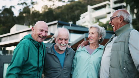 group of elderly friends laughing together
