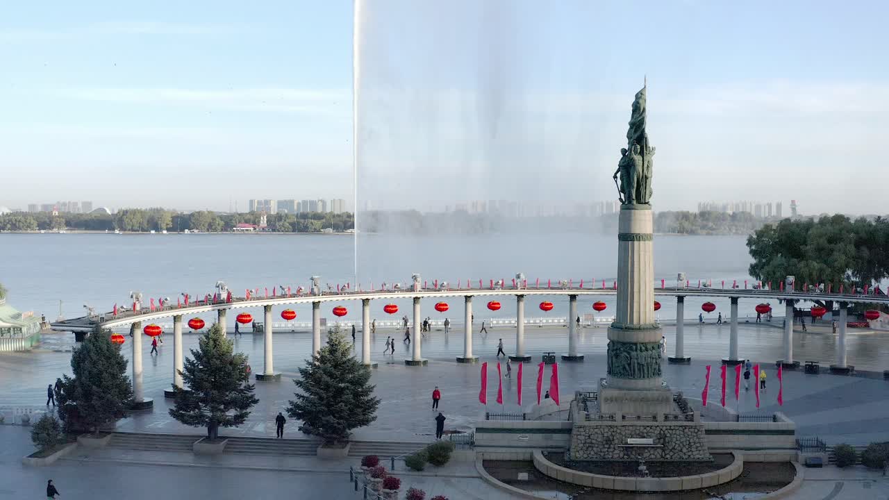 Stalin Park, or the Flood Control Monumnet is a historic centre piece in tribute to people working to control the great flood waters. day, morning shadows decorations for National Day Famous waterjet