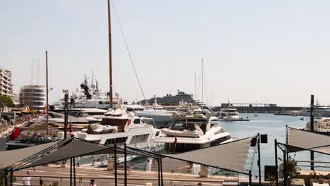 yachts docked in monte carlo harbor, sunny day