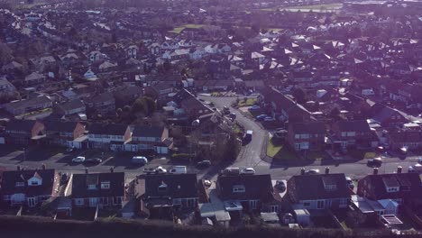 typical suburban village residential birmingham neighbourhood property rooftops aerial view left dolly