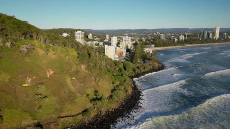 close aerial moving north over burleigh heads, gold coast, australia