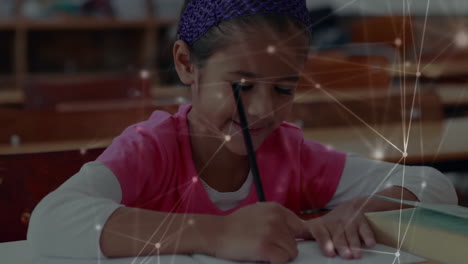 Niña-Sonriente-Escribiendo-En-El-Aula-Con-Animación-De-Conexiones-De-Red-Sobre-Ella