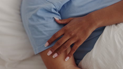 love, intimate and hands of couple in bed