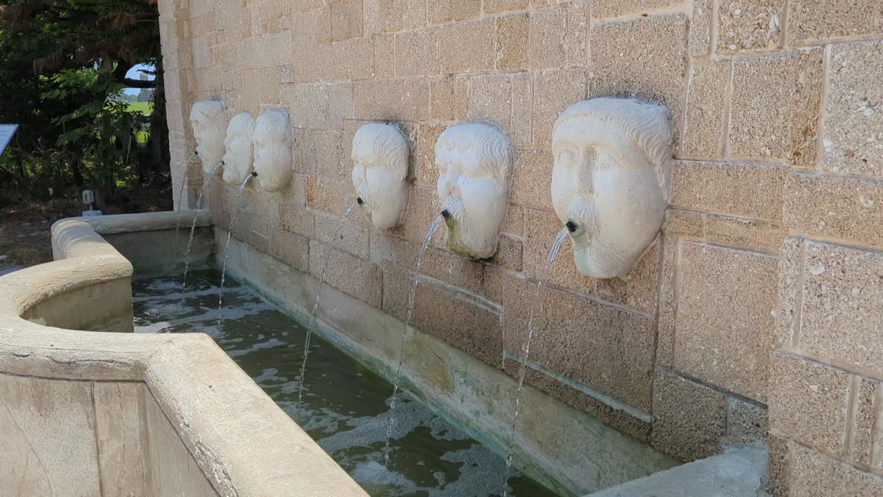 Face Fountains in St Augustine, FL. A set of masks that decorate this fountain was a gift to the City of St. Augustine by its sister city in Spain, the City of Avilés, birthplace of Pedro Menéndez.
