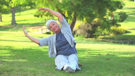 mature woman doing her stretches